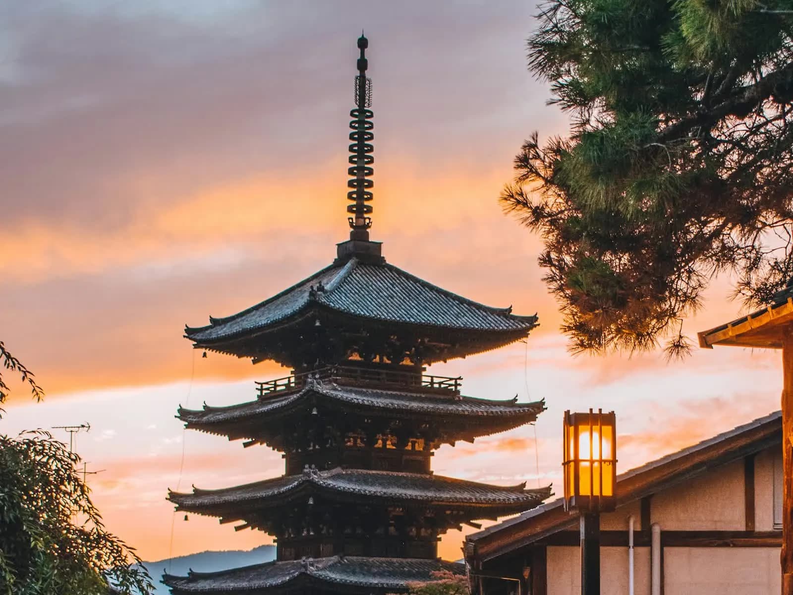 The Yasaka pagoda rising over Kyoto's Higashiyama district at sunset