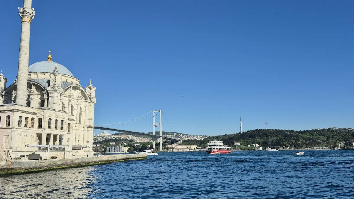 Dolmabahce Mosque and the Bosphorus bridge in Istanbul, Türkiye