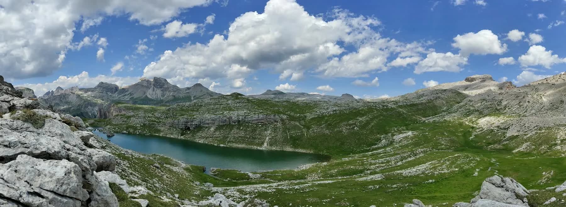 Alpine lake and mountain panorama in the Dolomites, Italy